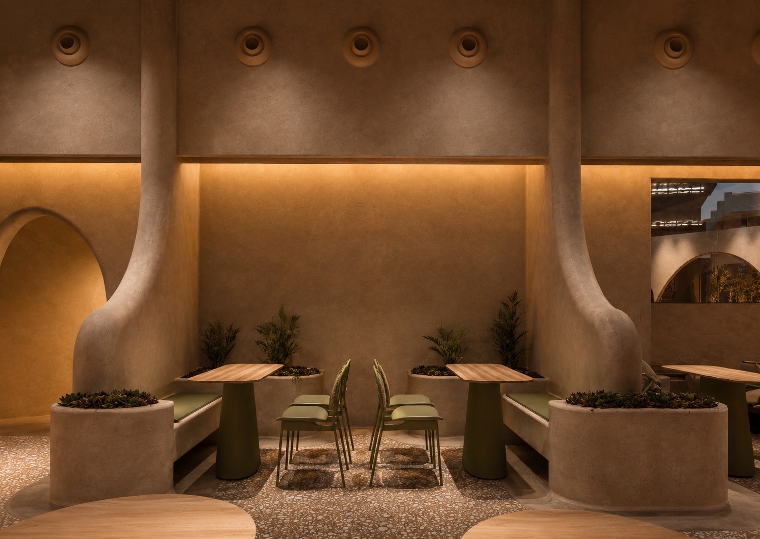 Arched niche seating with olive chairs and planters